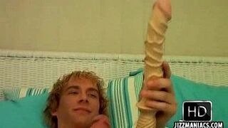 This sexy twink with a tattoo uses a dildo on himself porn video